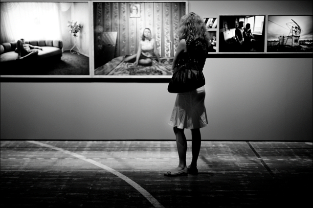 Visitor at Rafal Michal exhibition at C/O Berlin